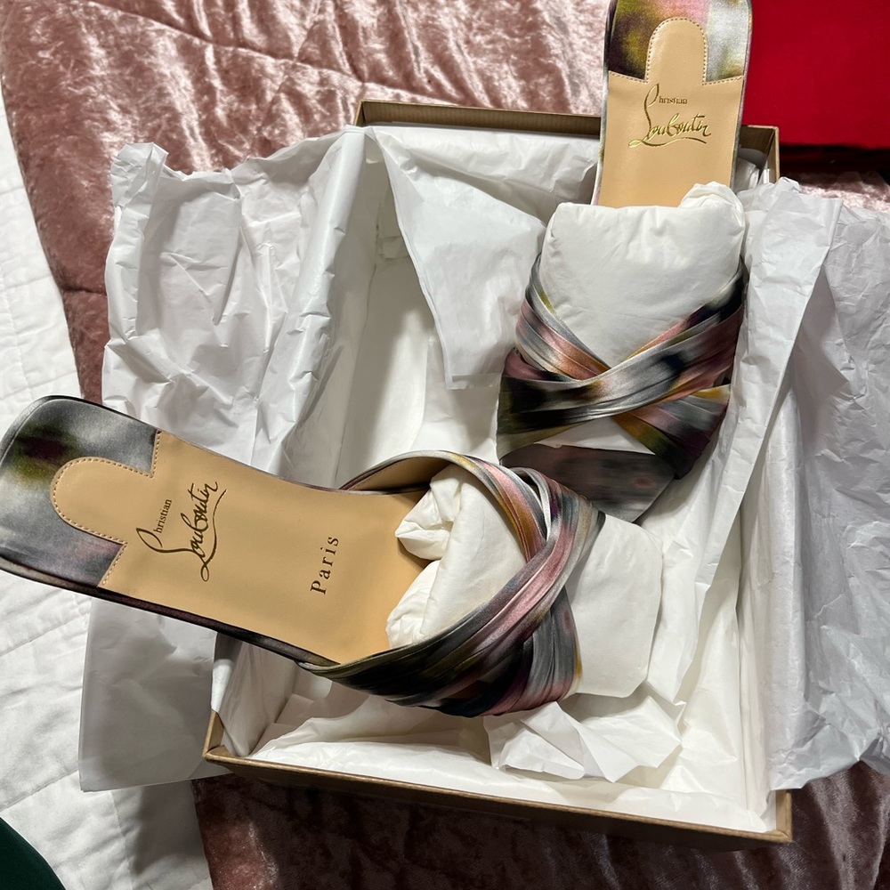 Never worn, multicolored Louboutins